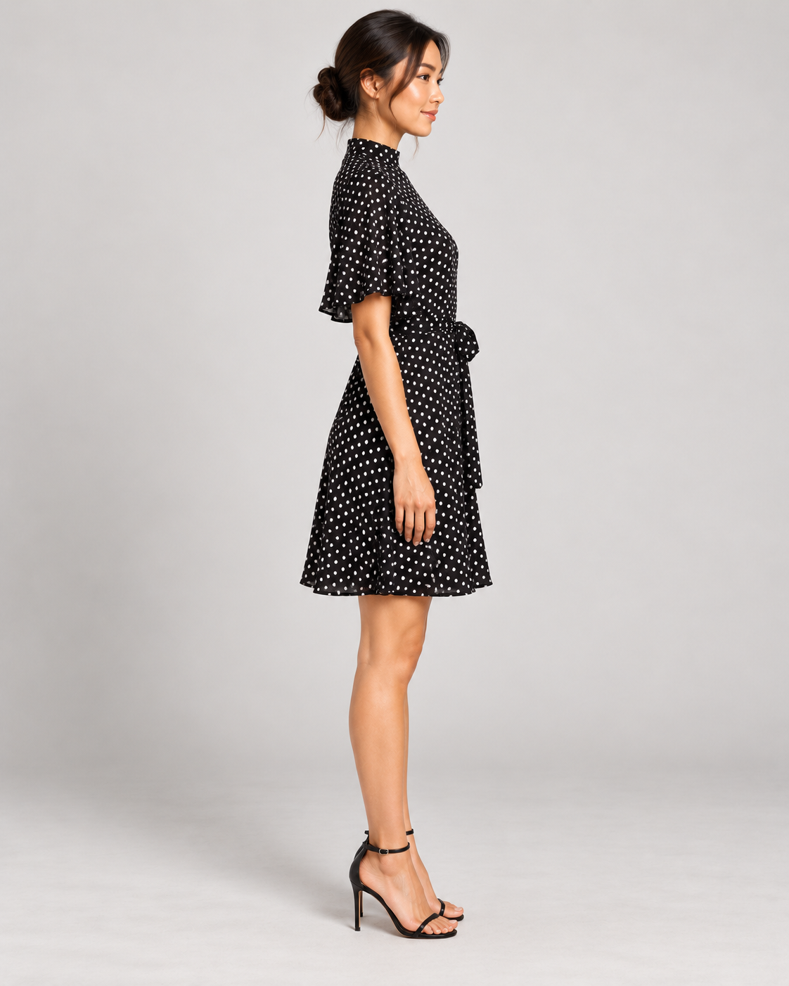 Black dress, full-length side view
