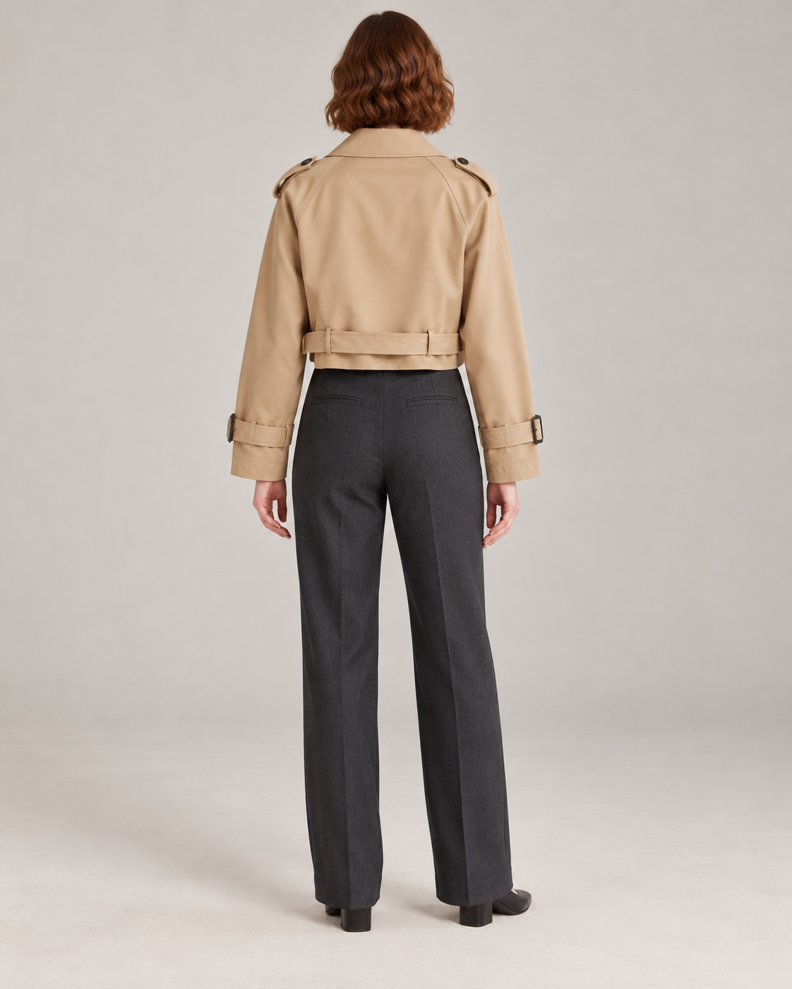 Brown trench-style jacket, full-length direct rear view