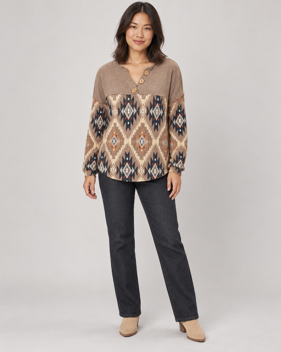 Brown geometric pullover top, full-length front view
