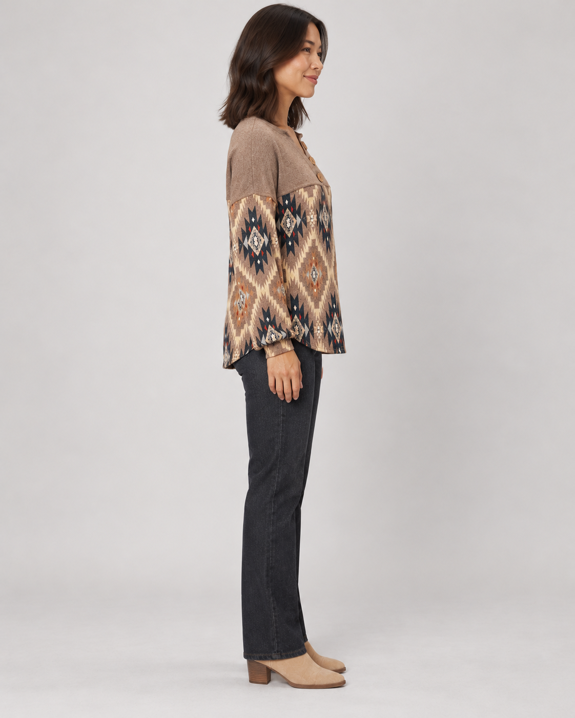 Brown geometric pullover top, full-length side view