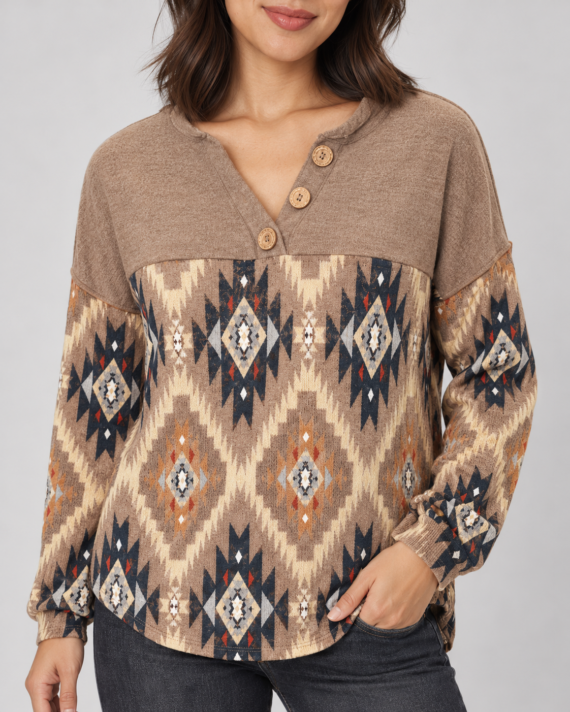 Brown geometric pullover top, close-up of buttons, knit, seam and print