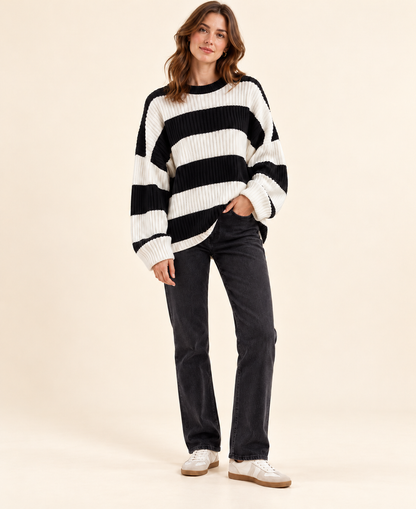 Black and ivory striped knit pullover sweater, three-quarter view