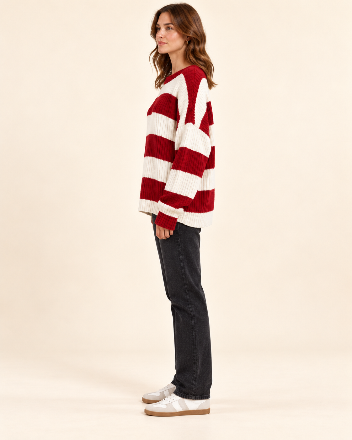 Red and ivory striped knit pullover sweater, side profile view