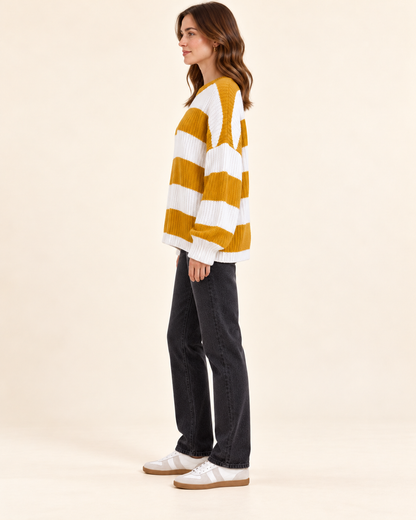 Yellow and ivory striped knit pullover sweater, side profile view