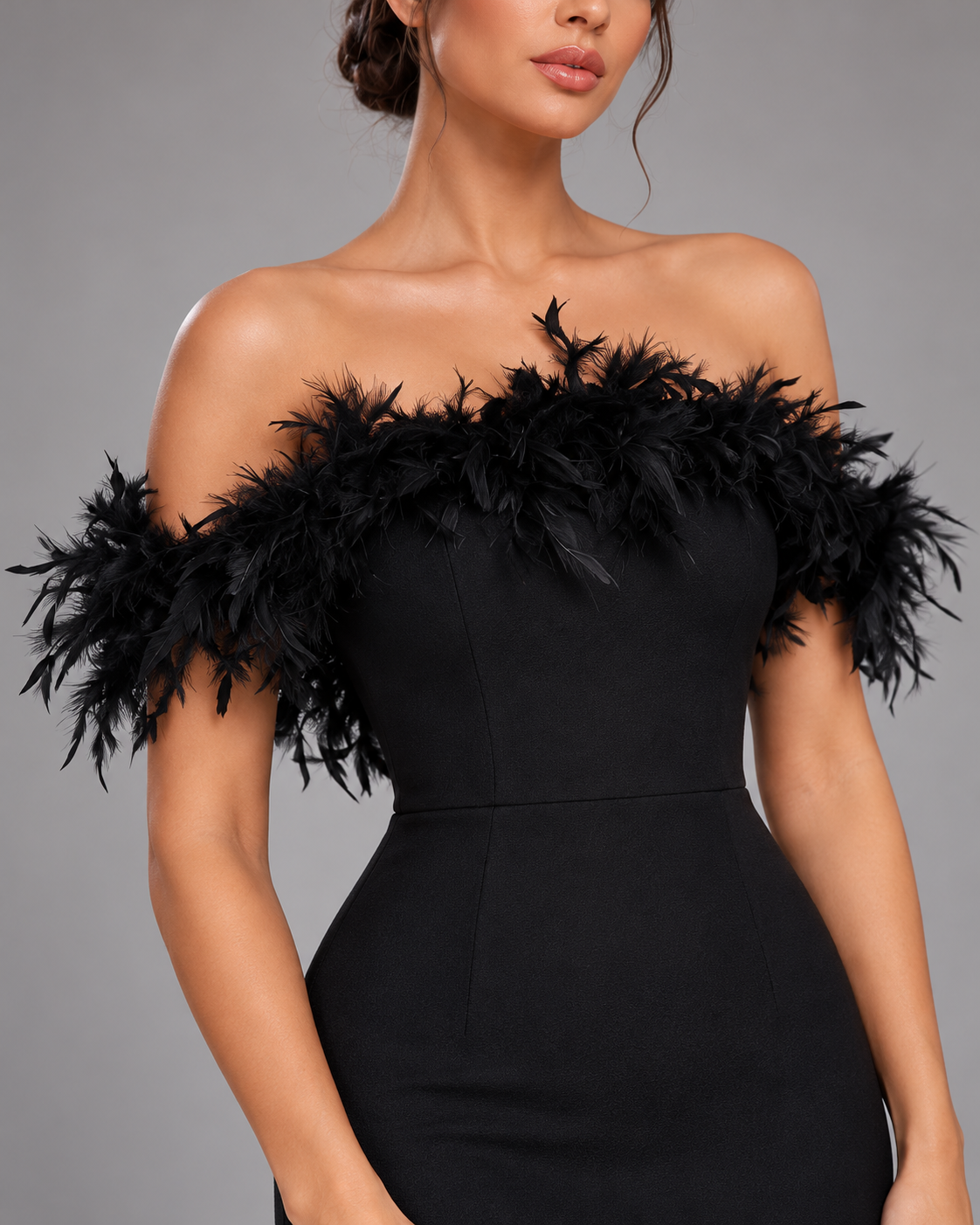 Black off-shoulder feather dress, feather and bodice detail