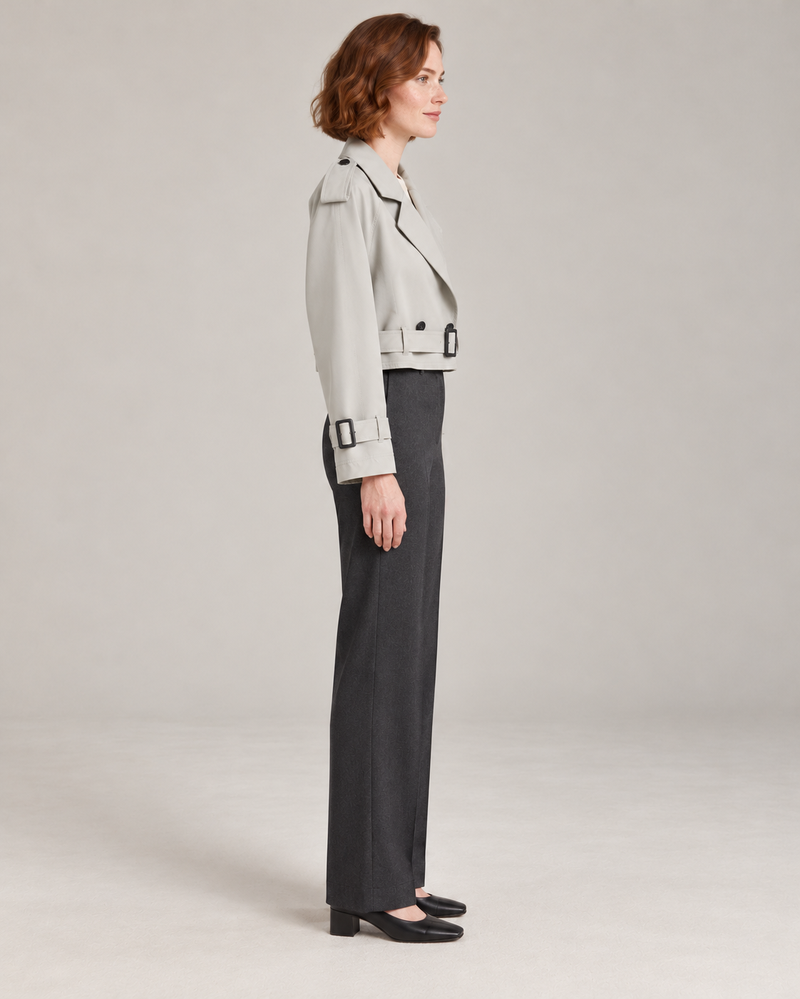 Gray trench-style jacket, full-length side view