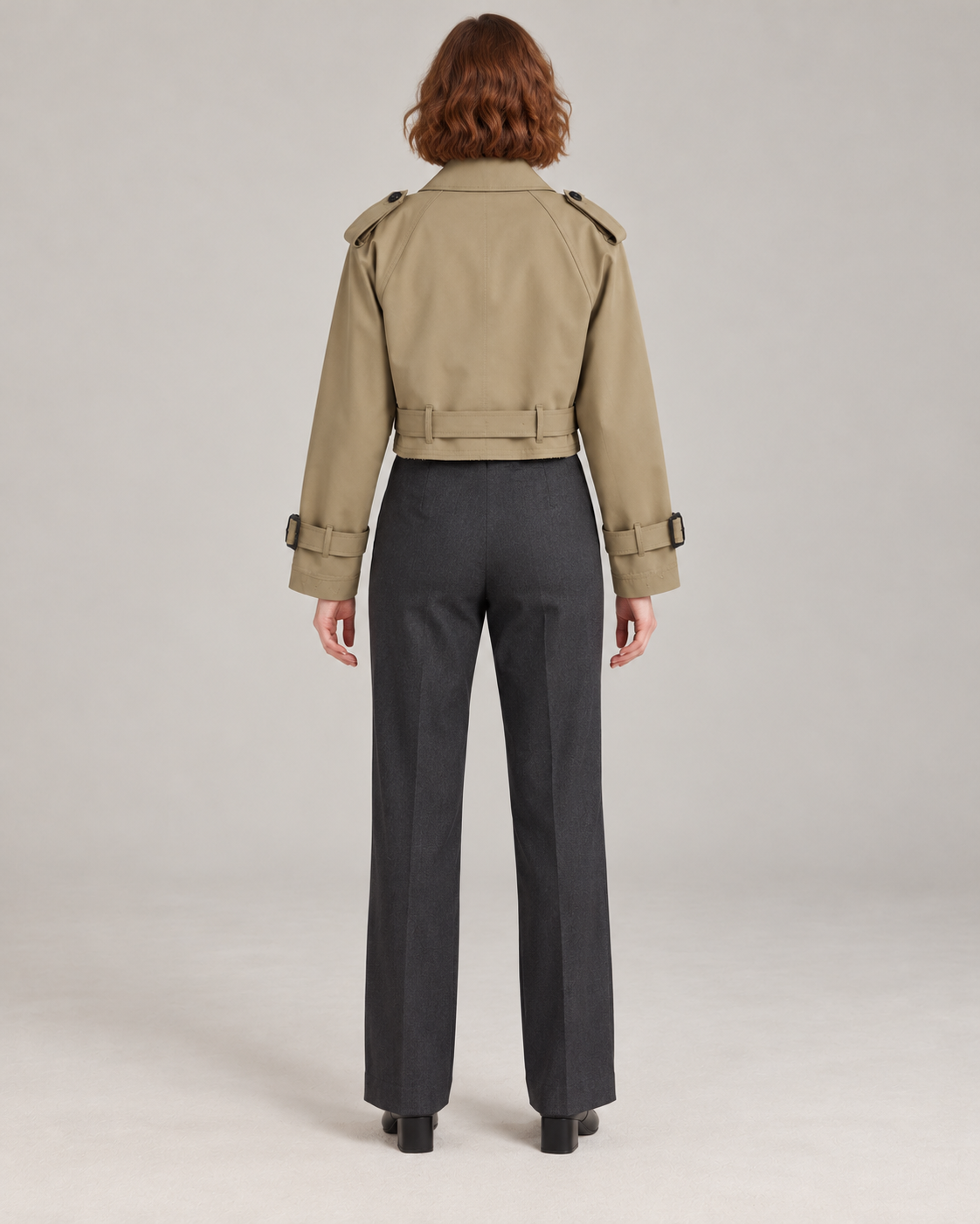 Khaki trench-style jacket, full-length direct rear view