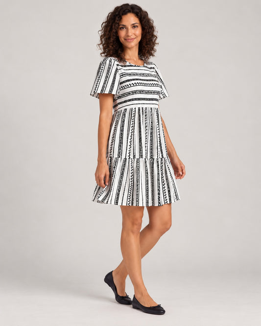 Full-length three-quarter view of the Black variant of the Women's Striped Round-Neck Tiered Dress