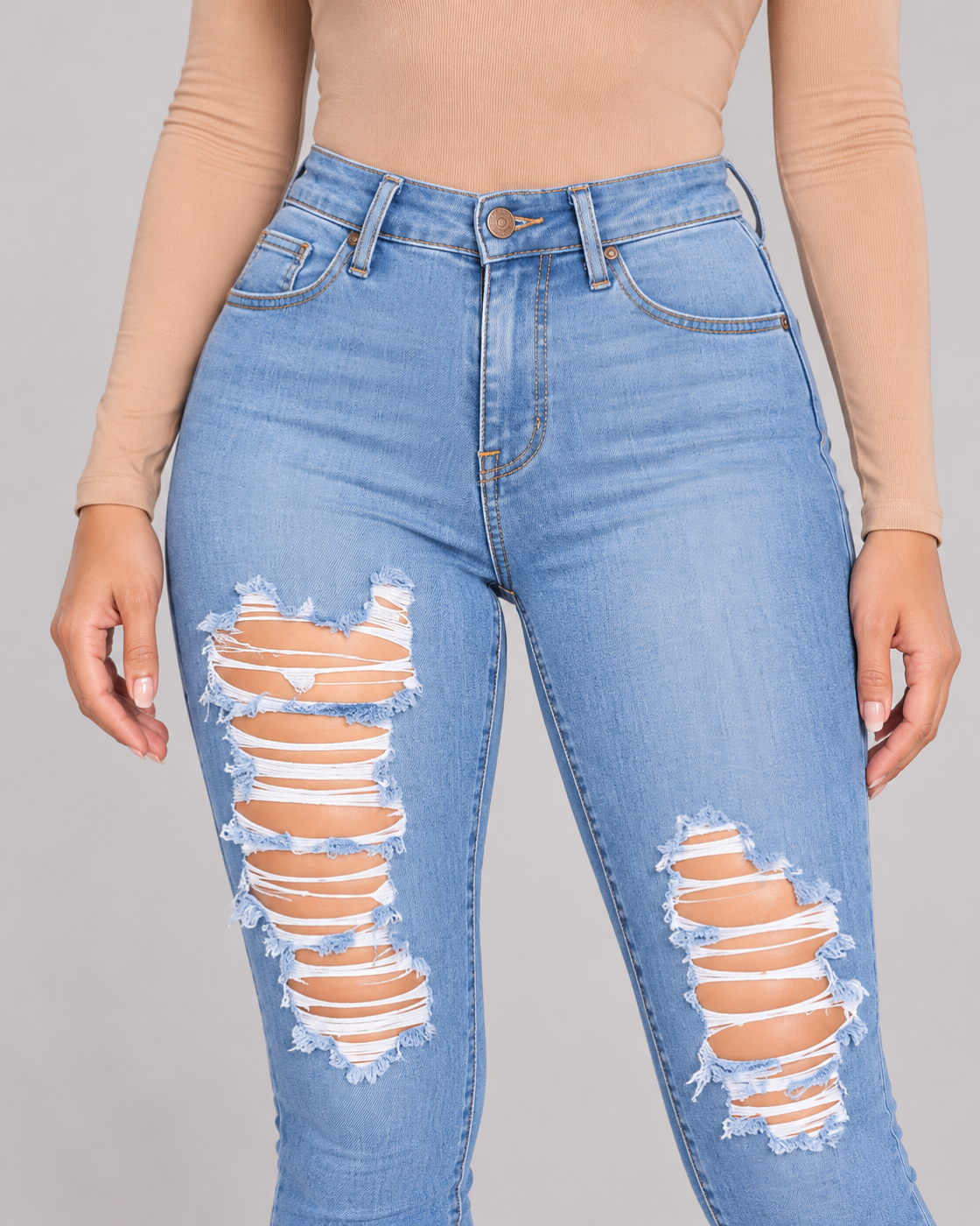 Light Blue jeans construction and distressing details